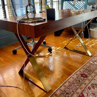 Jonathan Adler Channing Walnut and Brass Writing Desk.  Transform your workspace with the exquisite Jonathan Adler Channing Walnut and...