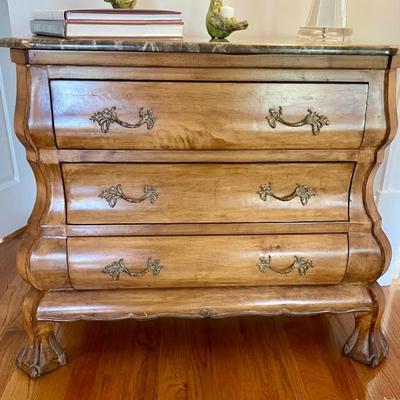 Kreiss Furniture 3-Drawer Chest Of Drawers with a light emperador marble top.