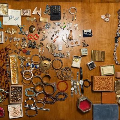 Vintage costume jewelry, brooches, and boxes