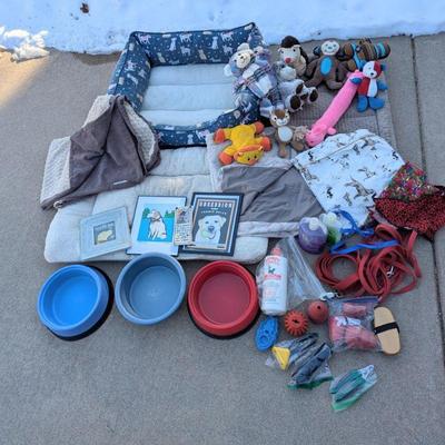 Lot #194 - Pet Care and Accessories Lot - Beds, Toys, Bowls, Grooming Supplies, and Decor.