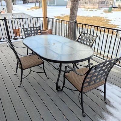 Lot #25 - Outdoor Patio Dining Set - Glass Table with Four Chairs