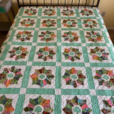 Lot #125 - Handmade Colorful Quilt with Shamrock Design.