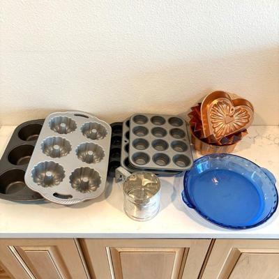 Lot #49 - Baking Supplies Lot - Various Cupcake and Pie Pans and more.