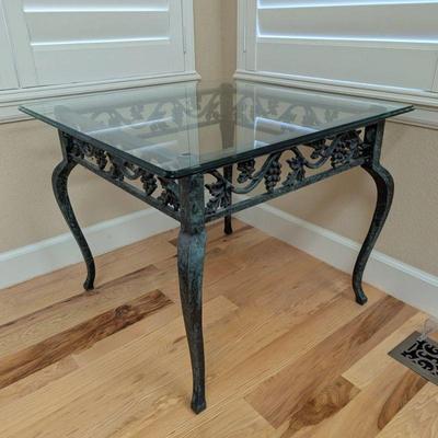 Lot #1 - Iron and Glass Table with Grapevine Design.