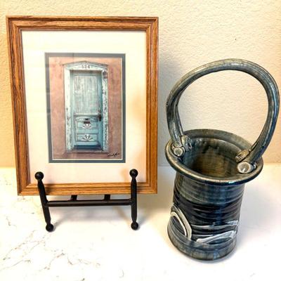 Lot #48 - Michael L John Signed & Framed Art 'Blue Door,' on Metal Stand with Signed Pottery Basket