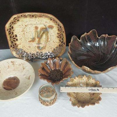 Large handmade bowls, 2 smaller flower bowls, and clay votive