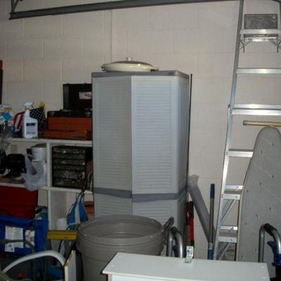 Plastic 2 Door Cabinet ; Ladder(s) and other garage items.