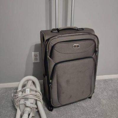 Pacific Coast Greyish Green Suitcase with Wheels and Oreck XL Vacuum