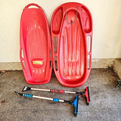 Winter Lot! Two Red Snow Sleds and Two Telescoping Ice Scrapers with Snow Brushes