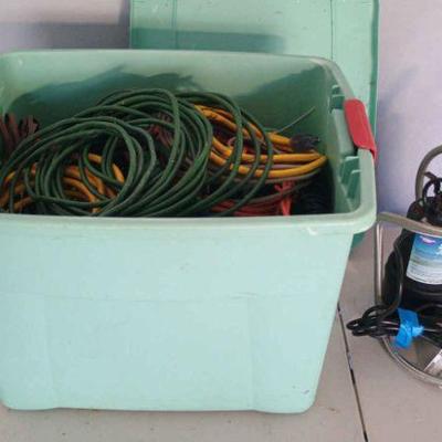 Submersible Pump And Bin Of Extension Cords