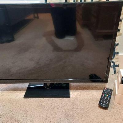 Flat screen tv with apple tv device