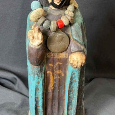 Wood carved religious figure with coin pendant necklace