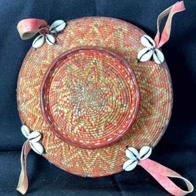 Vintage ethiopian handwoven coil basket with cowry shells leather
