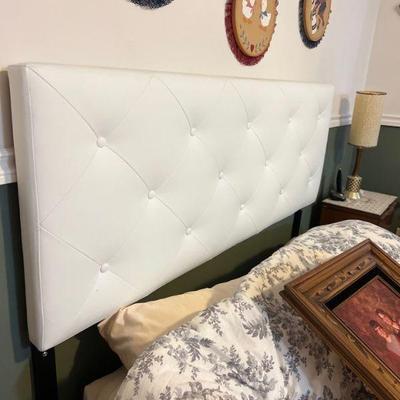 White tufted bed