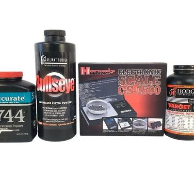TEWA805 Gunpowder And Hornady Powder Scale	Three jars of gunpowder and GS-1500 electronic powder scale. Hogdon and Bullseye jars have...
