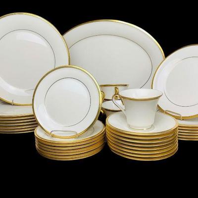 TICA632 Lenox Eternal Gold Rim Pattern China Set	This set includes eight tea cups with saucers, one platter, eight bread plates, seven...