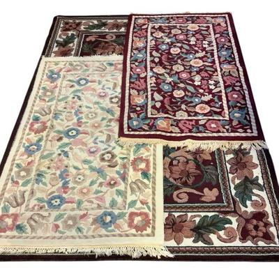 TICA634 Floral And Red Area Rug Assortment	Some wear visible with spotting on ends or discoloration.
