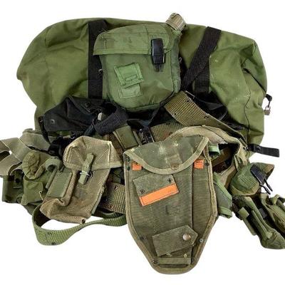 TEWA208 US Military Bag Full Of Utility Belts With Holsters & More	Large bag full of utility belts and harnesses and more.
