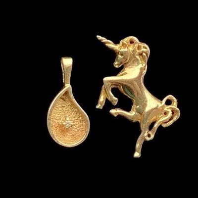 BEBO916 Stamped 14K Gold Pendant And Stamped 10K Gold Unicorn Charm	The 14k pendant weighs approximately 1.41 grams including the stone....