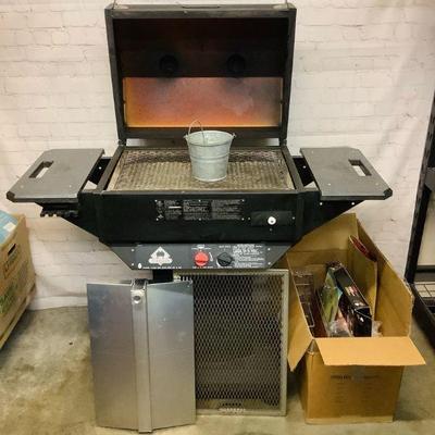 TICA814 The Holland Grill + Accessories	Includes spare rack setup, half rack still in box, rib rack, grilling wok, new brush, and branded...