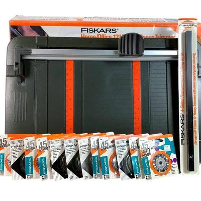 TICA220 Fiskars Home/Office 12” Rotary Paper Trimmer & Accessories	Paper trimmer with straight blade and 4-sided cutting strip. Comes...