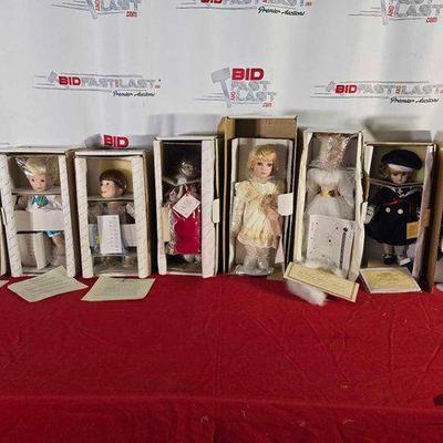 #2292 • (8) Porcelain Dolls
