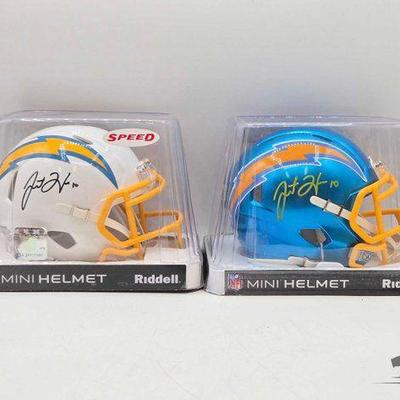 #1834 • (2) Chargers Justin Herbert Signed Riddell Mini Helmets
