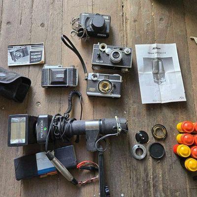 #10604 • (4) Cameras, Flash Mount, Attachments & Instruction Manuels
