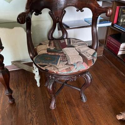 Antique round backed armchair with cushion