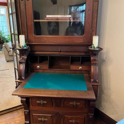 Tall late 19th century secretary desk with glass hutch and drawers, plus little shelves for candlesticks in gorgeous condition