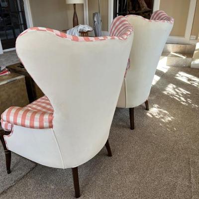 Pair of antique wingback chairs, recently reupholstered in apricot and ivory check silk