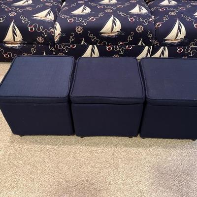 A set of 3 navy blue storage cubes