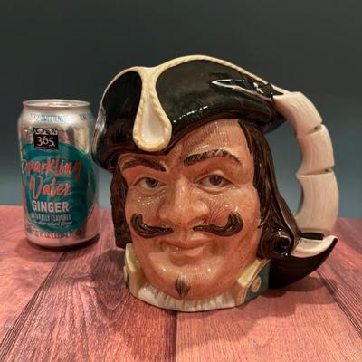 Loads of Toby jugs, character jugs in all sizes from Royal Doulton, Sterling and Artone—Winston Churchill, Falstaff, Neptune, pirates,...