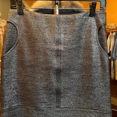 Designer clothing—sizes 2-6, some 8s; designer shoes, incl. Ferraegamo and Prada, sizes 9M-10M, vintage furs, fun tees, fancy golf shirts...