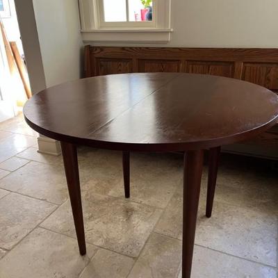 MCM style wooden dining table with 2 leaves