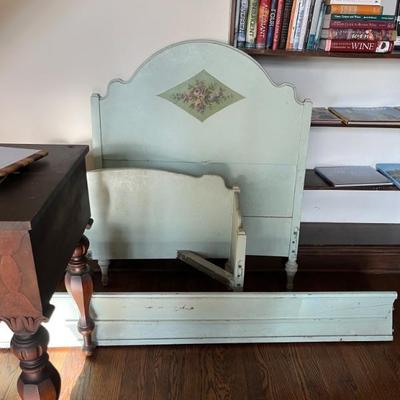 Antique child’s bed, pale green painted with flowers