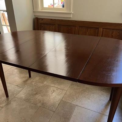 MCM style wooden dining table with 2 leaves