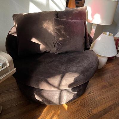 Large round swivel chair in brown with cushions from Wayfair 