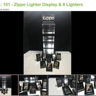 Lot # : 151 - Zippo Lighter Display & 8 Lighters
Display measures 5 1/2" x 16" without Zippo sign. Included are 8 Zippo...