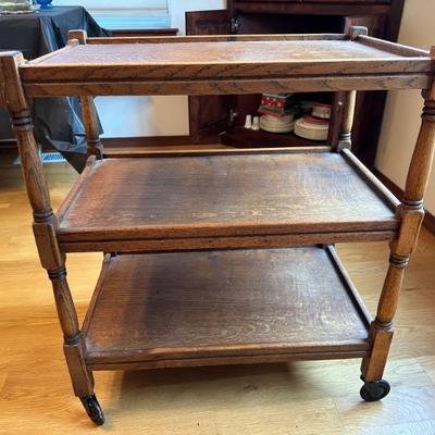 Antique rolling bar cart