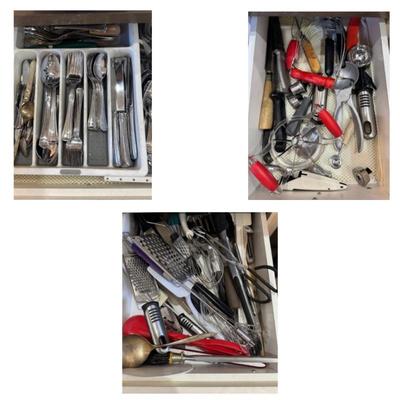 3 drawers full of kitchen Utensils