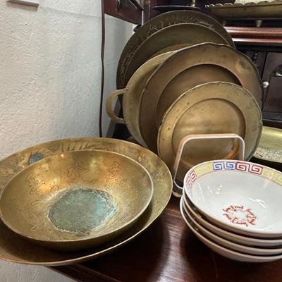 Large collection of brass plates and bowls
