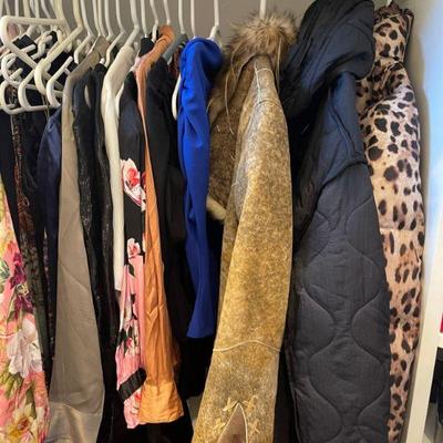 3 closets full of designer clothing. 