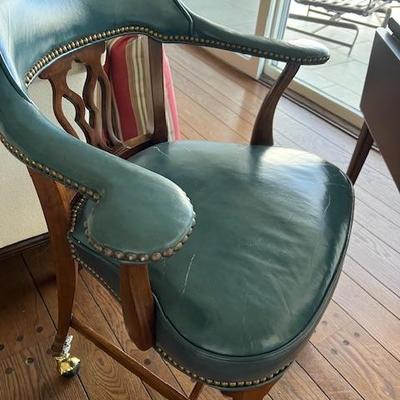 Leather desk chair on wheels