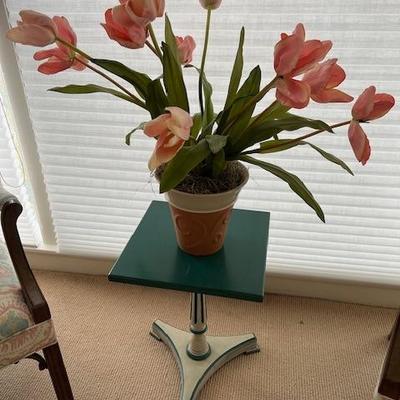 Small table with artificial flowers