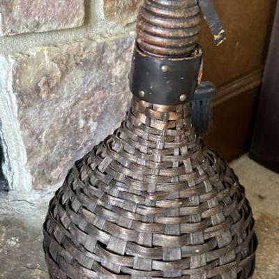 Brown wicker water jar