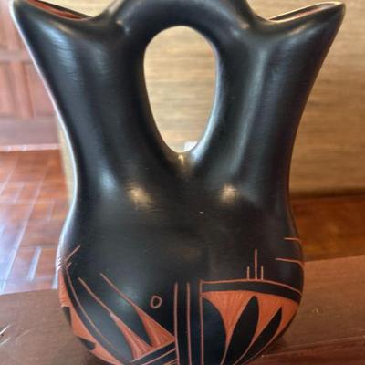 Native american pottery black vase etched design