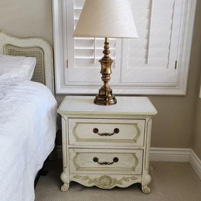 Victorian nightstand with vintage brass lamp