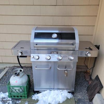 Stainless steel 28" grill with 2 propane tanks.
$135