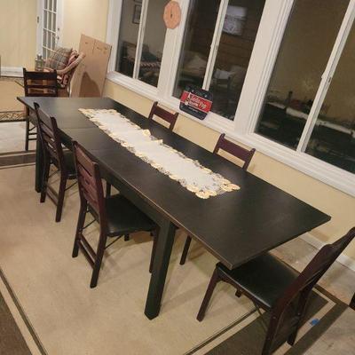 Sale Photo Thumbnail #64: Wood table with 6 chairs & 2 leaves. Table is 68" wide & 38: w.
Leaves are installed in photo & they are17" each. Chairs are folding.
$90